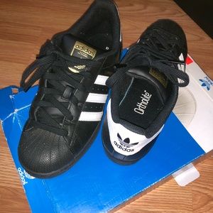 Black adidas shell toe